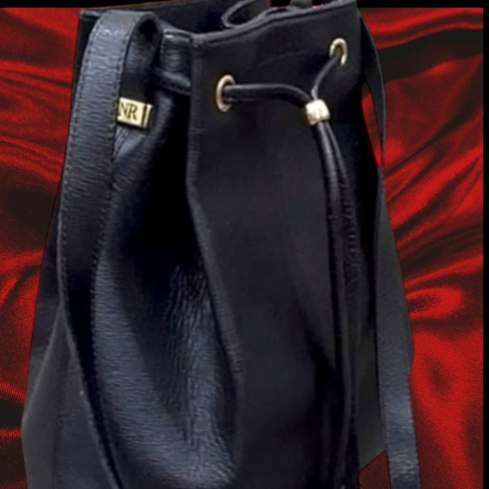 Vintage Nina Ricci Black Leather Bucket Bag
RARE Made in France